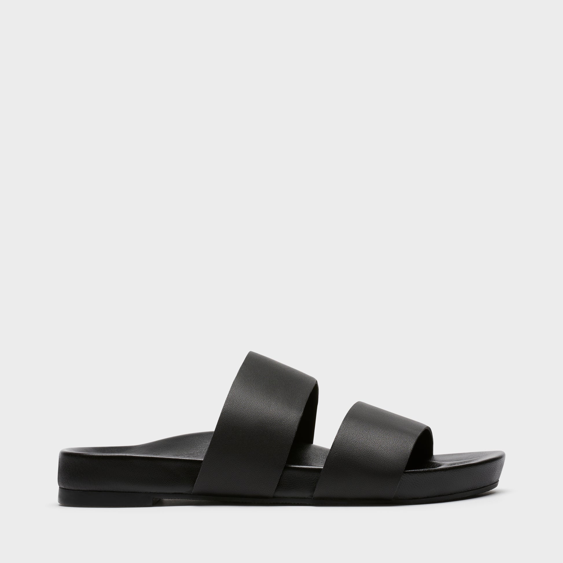 Sécra Daisy black leather slides