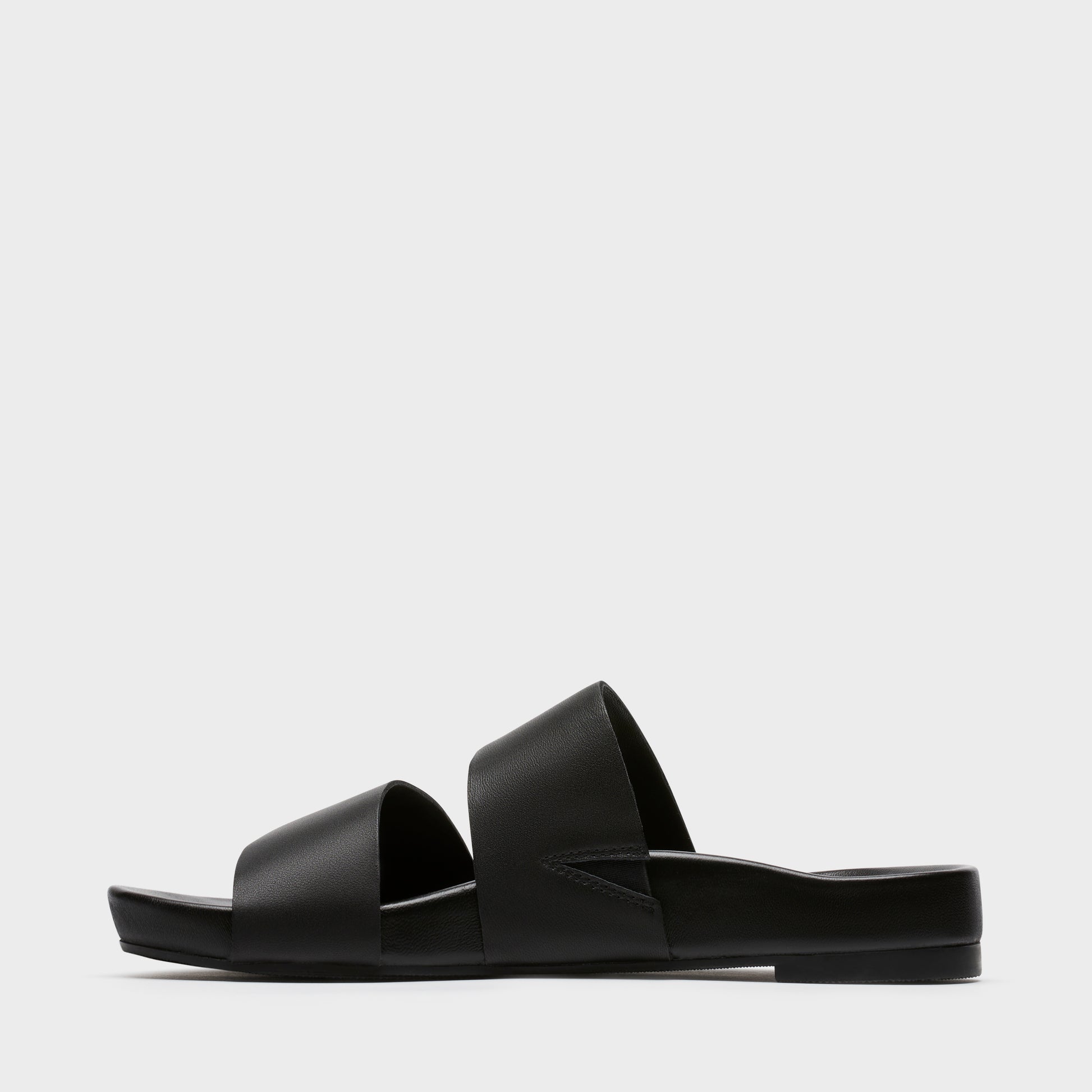 Sécra Daisy black leather slides