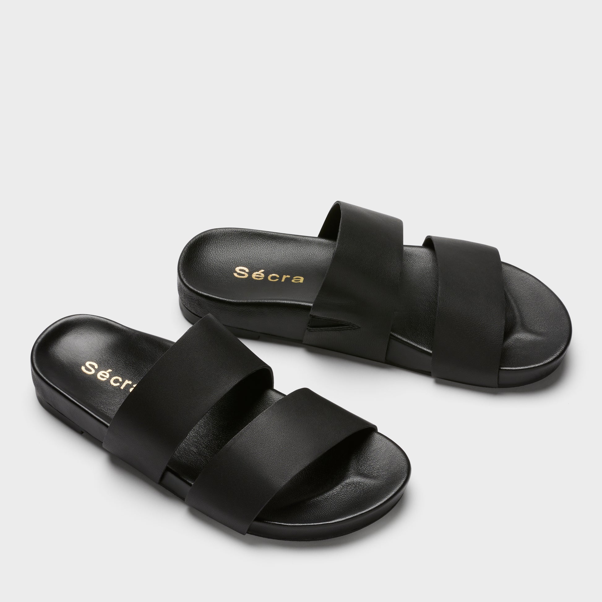 Sécra Daisy black leather slides