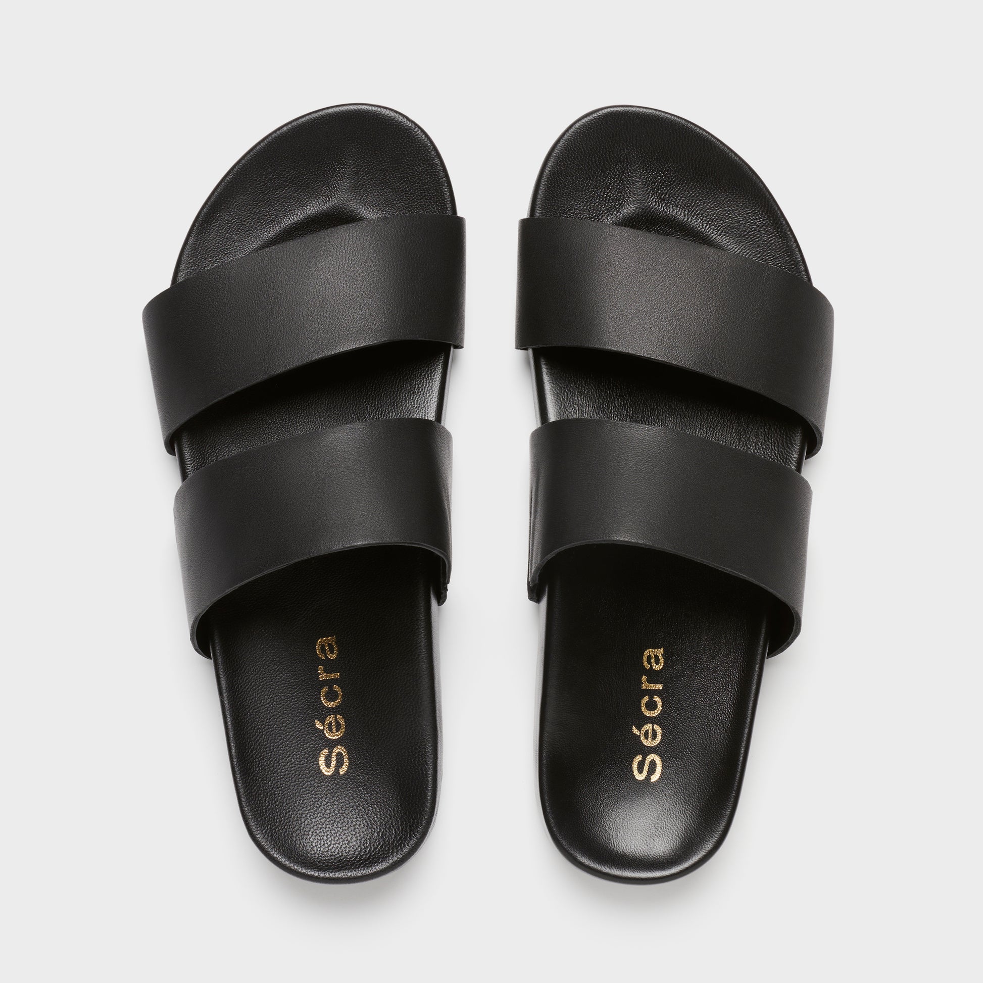 Sécra Daisy black leather slides